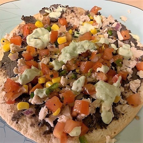 Chicken tostada on plate